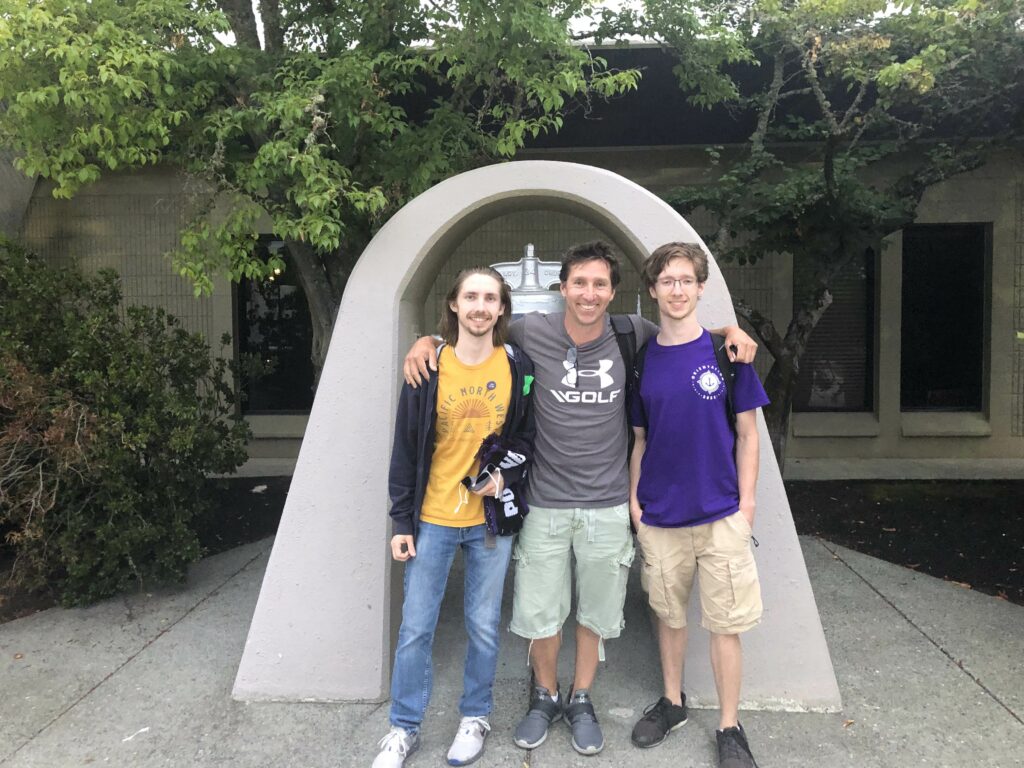 Darren with his Clients and his family.